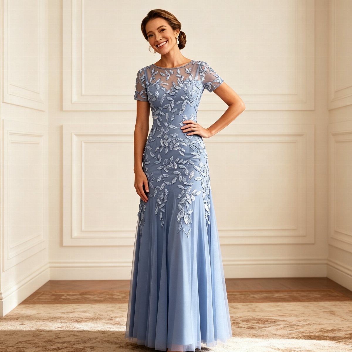 Woman in a long light blue embroidered formal gown in a white room